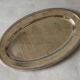 Set of three Letang & Remy stainless steel dishes.