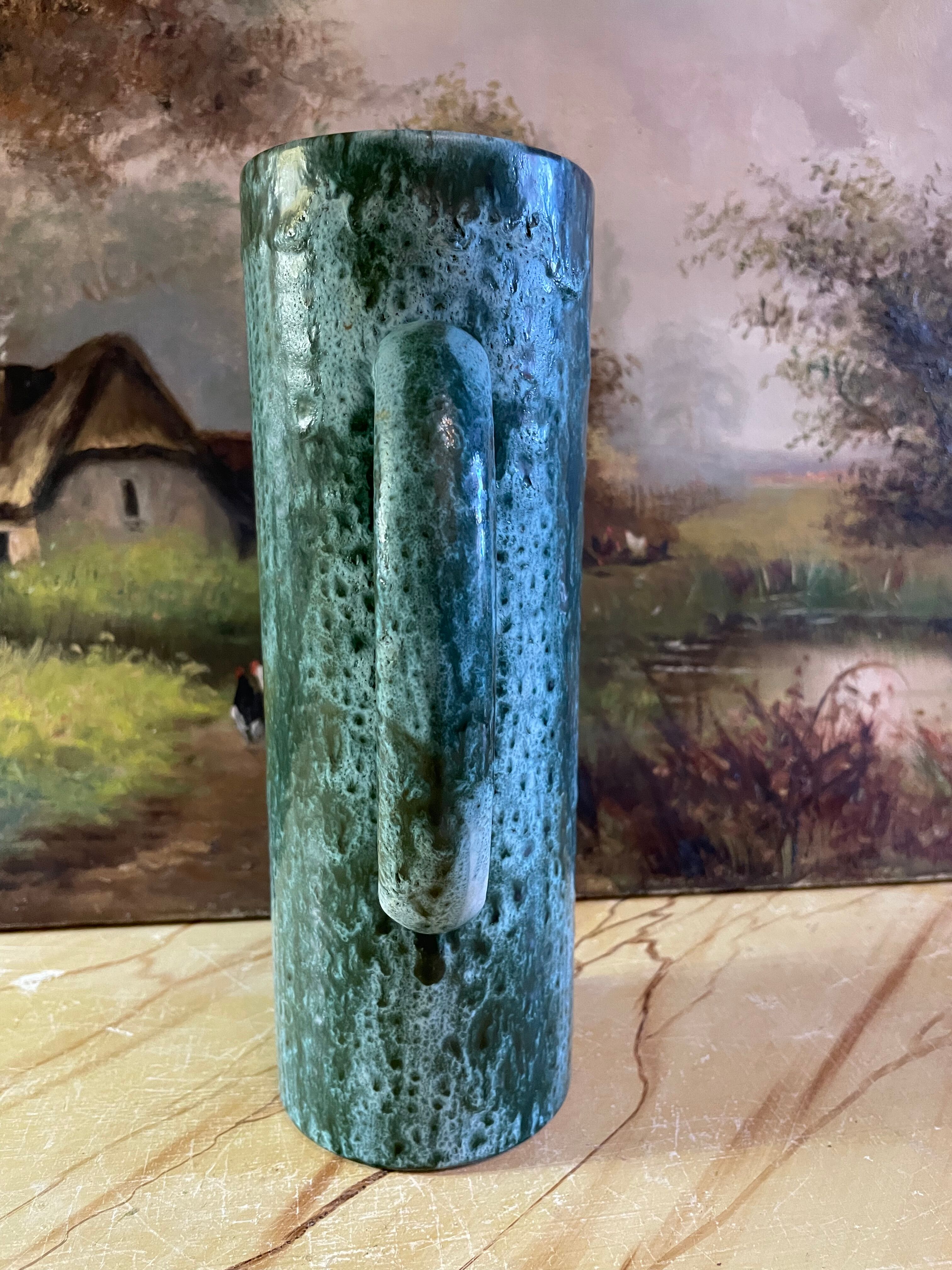 Blue ceramic pitcher