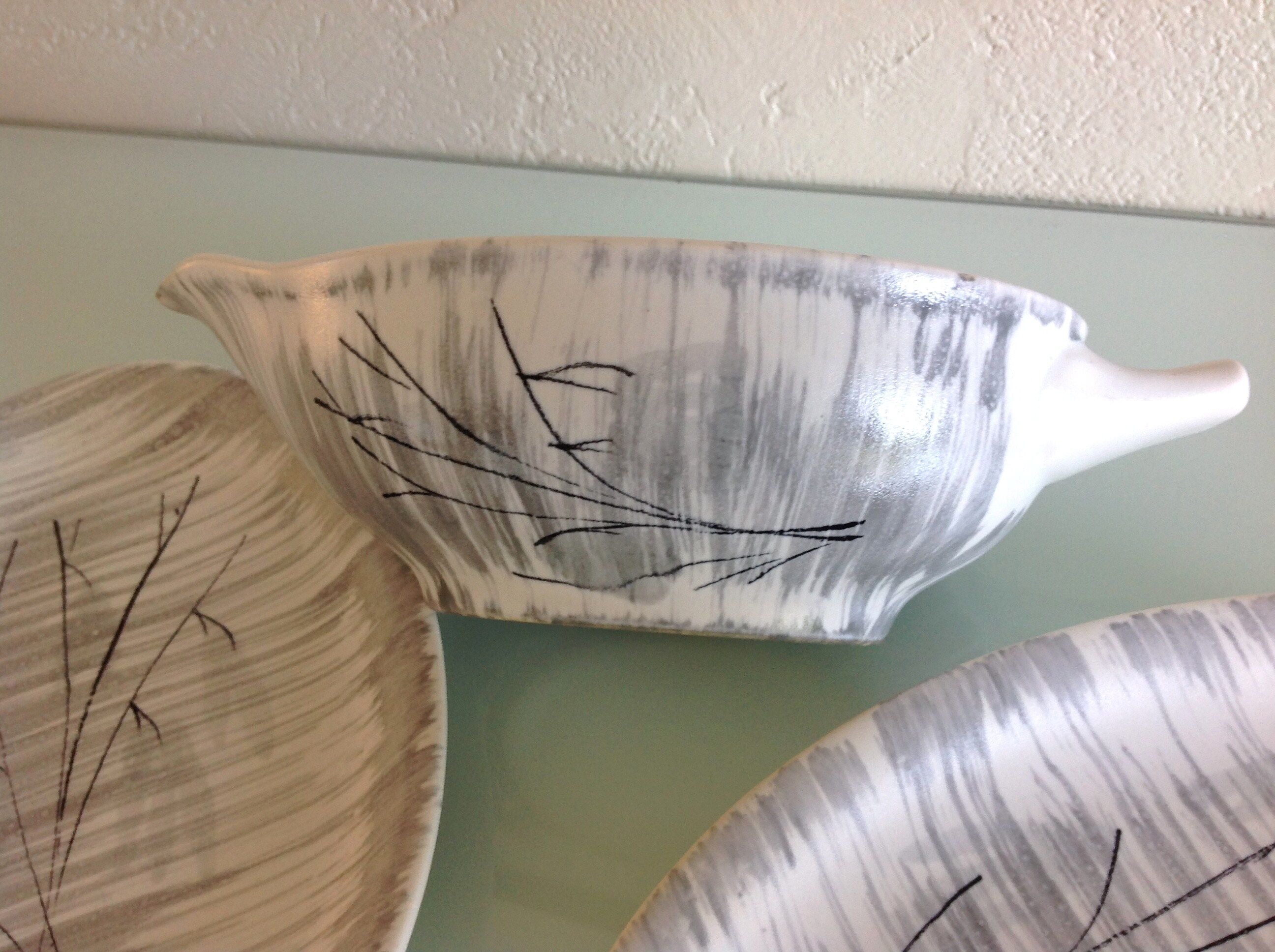 Two raviers and a white and grey cermal sauciere