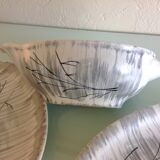 Two raviers and a white and grey cermal sauciere