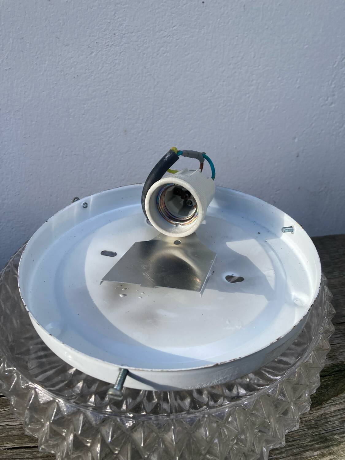Pair of transparent round glass wall lights