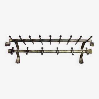 Wrought iron wall-mounted coat rack