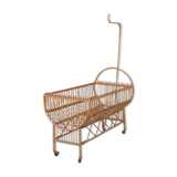 Vintage rattan crib, casters and matte for bed sky
