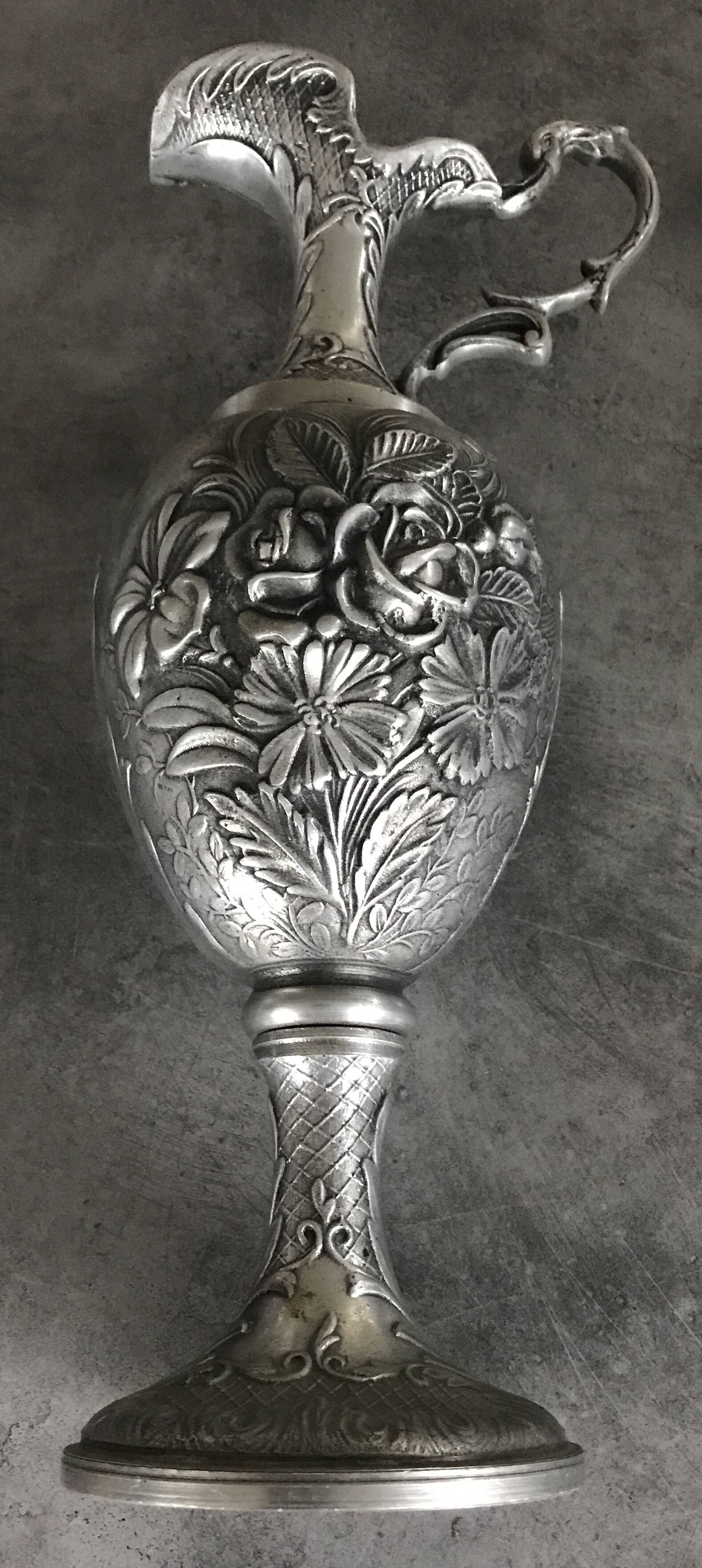 Ewer, Mauro Manetti art foundry, floral embossed decoration and bird's head handle