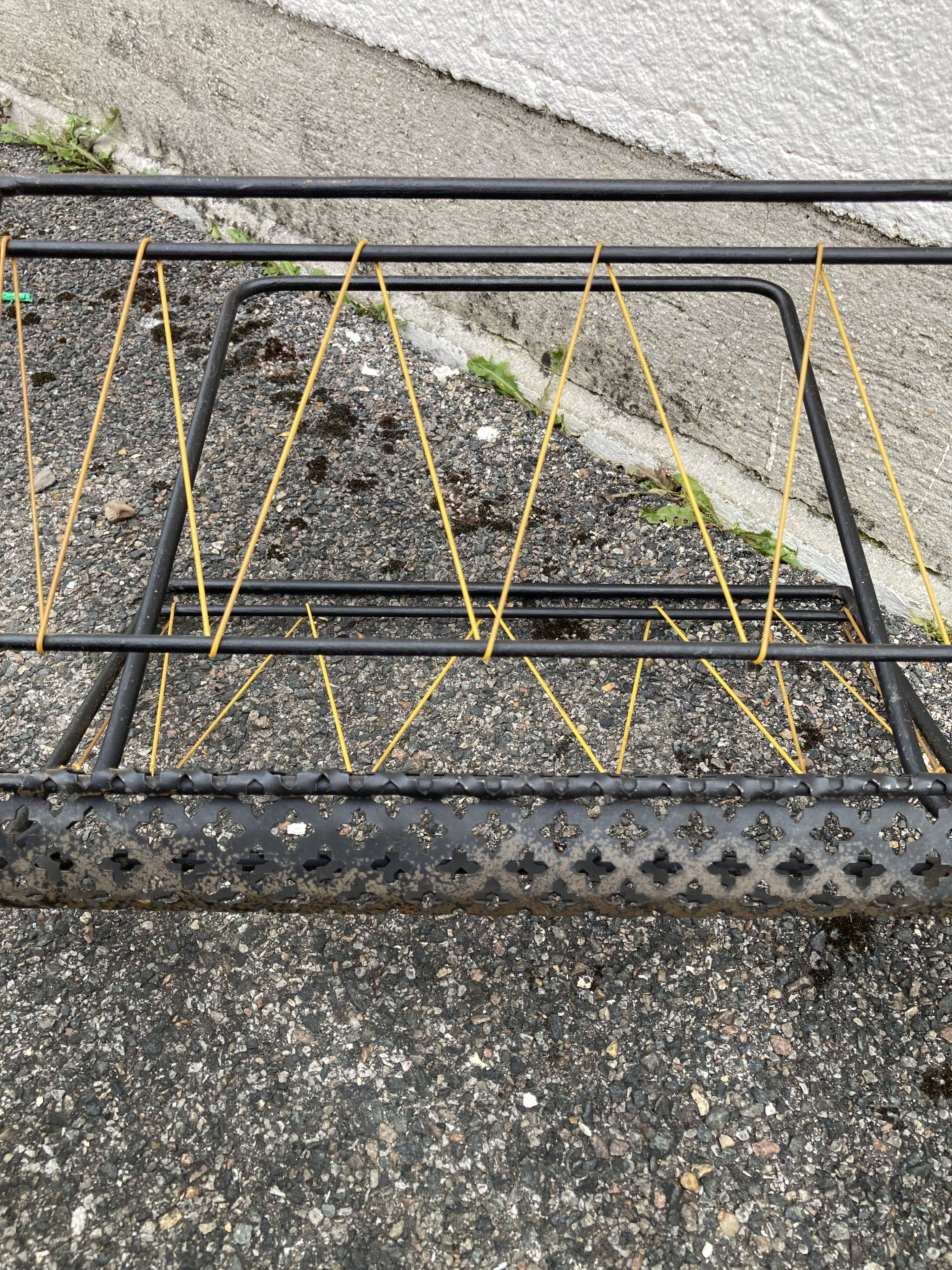 Magazine rack in the style of Mathieu Matégot (1910-2001)