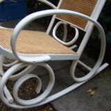 Antique caned rocking chair