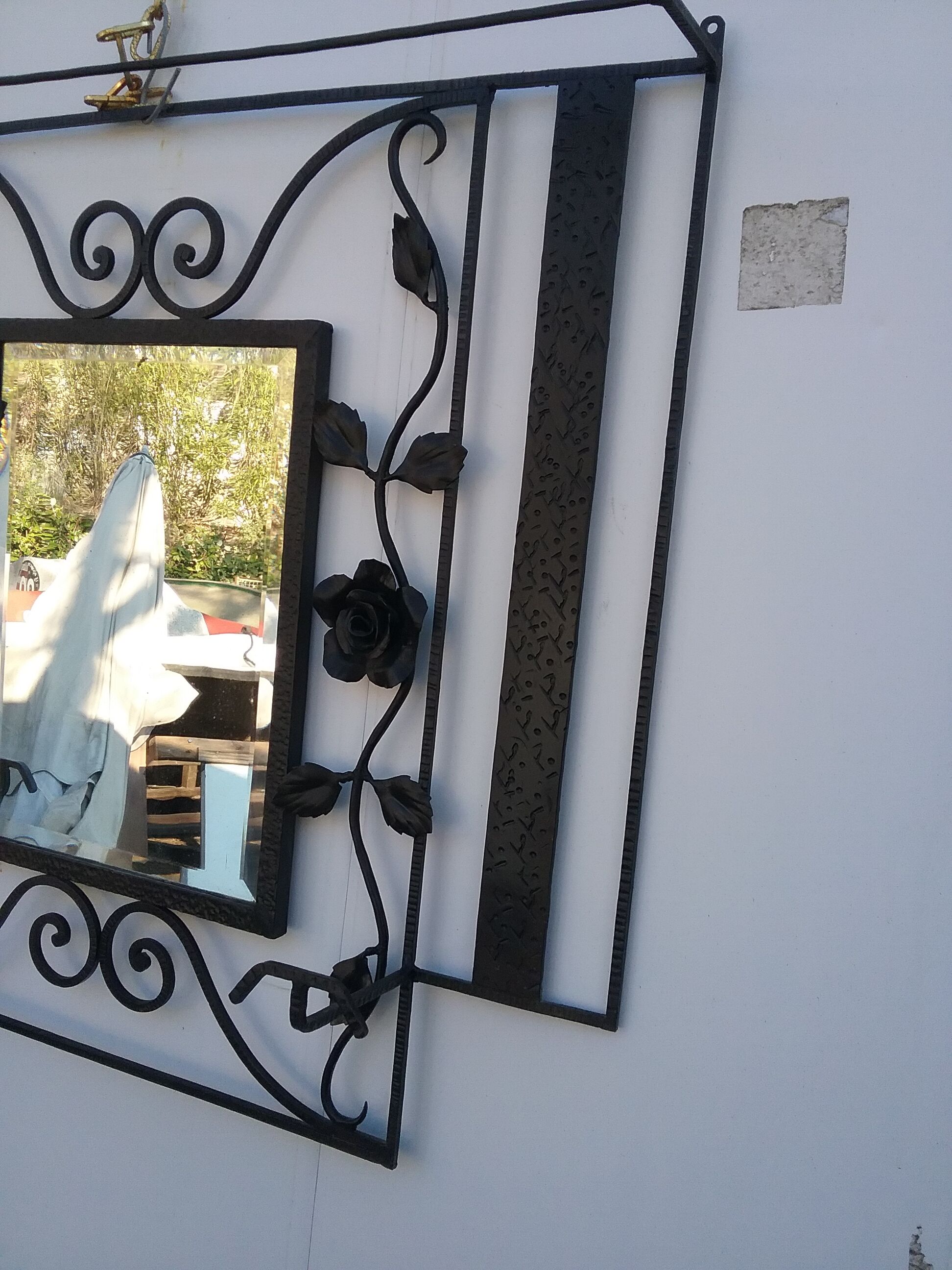 Coat rack in wrought iron art deco