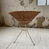 Wicker garden basket on tripod support