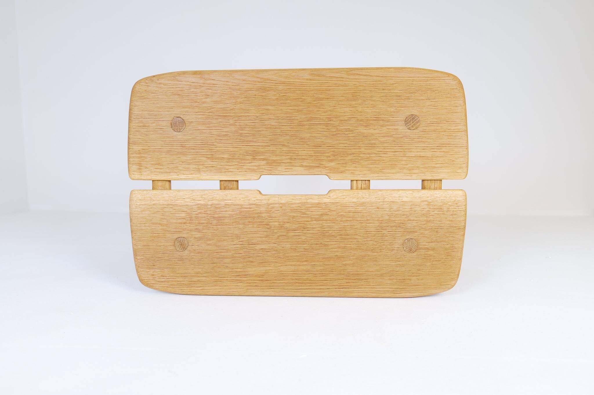 Sculptural mid-century stool in solid oak by Carl Gustaf Boulogner, Sweden, 1950s.