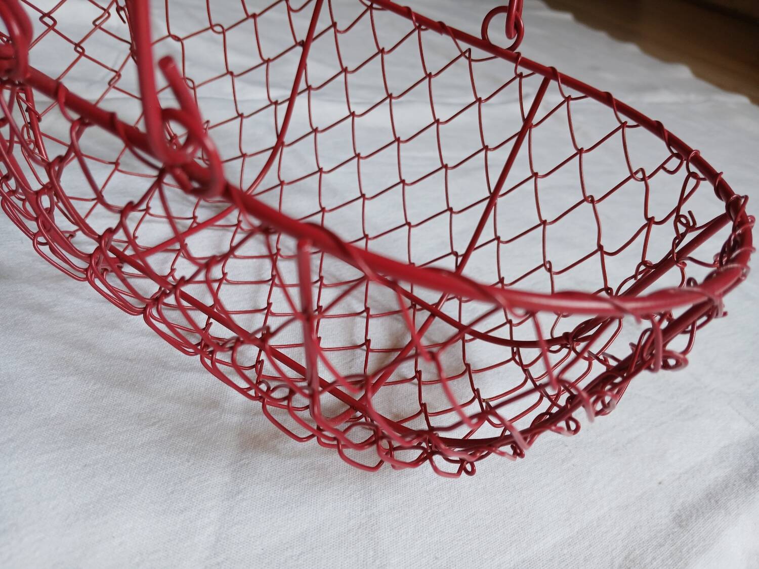 Small red metal basket