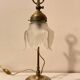 Brass table lamp with a glass shade