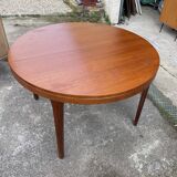 Round teak dining table