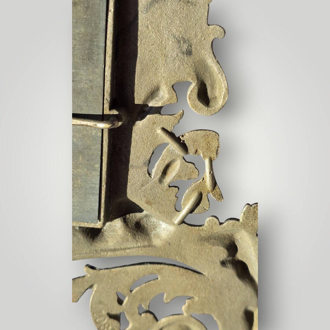 Gilded bronze wall mirror, beveled glass