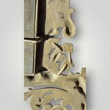 Gilded bronze wall mirror, beveled glass