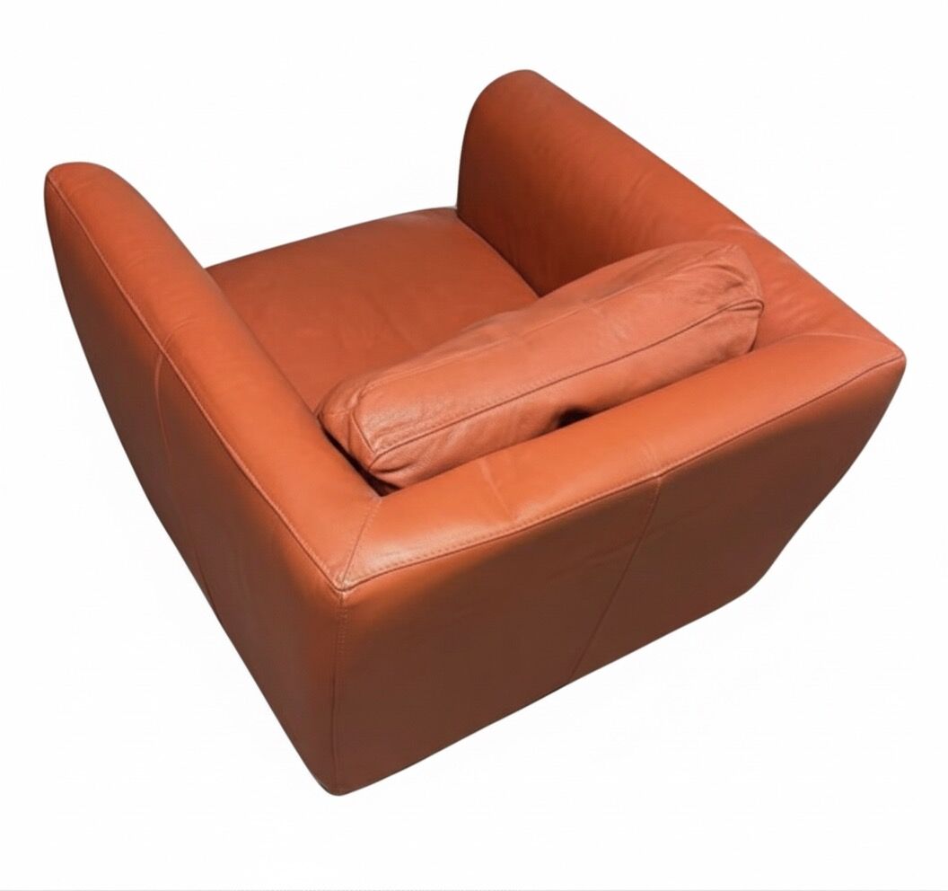 Roche Bobois armchair in mandarin colour.
