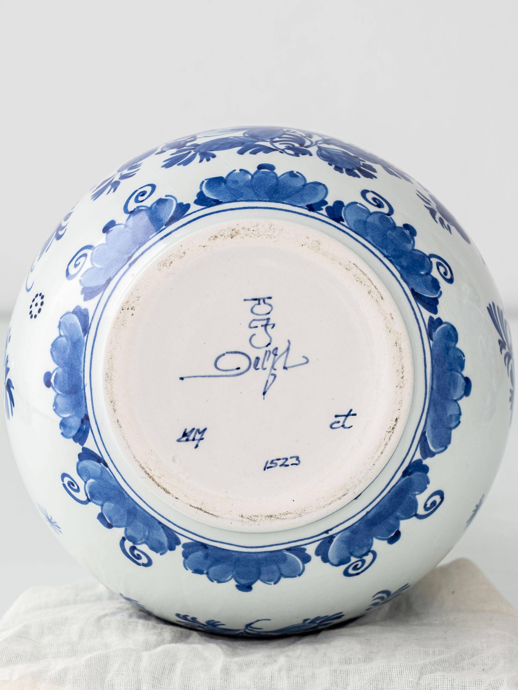 Pair of Royal Delft blue and white ceramic table lamps with new vermilion silk shades.