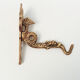 Coat hanger in rococo style, fish, dragon, dutch man and woman