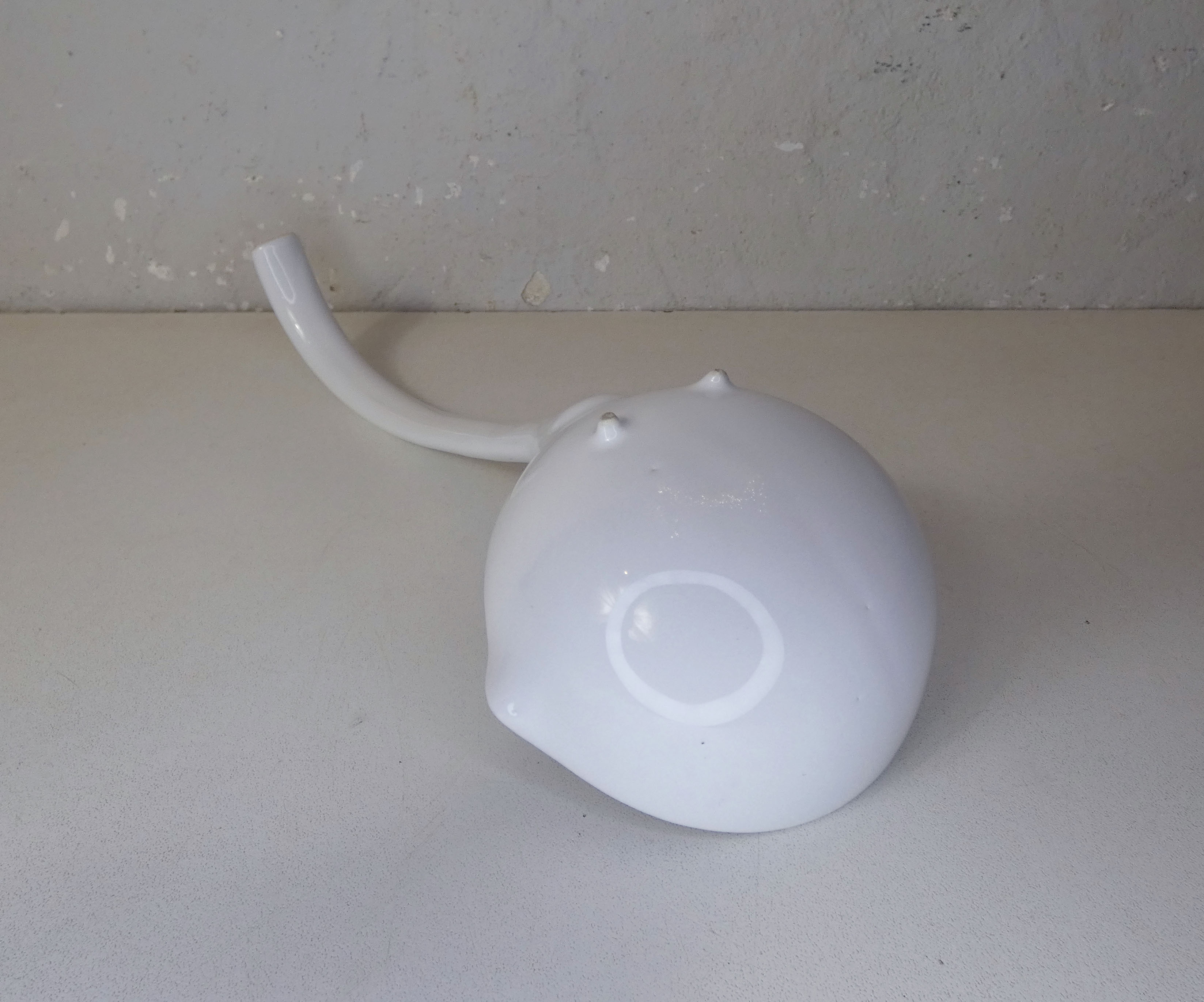 White ceramic ladle