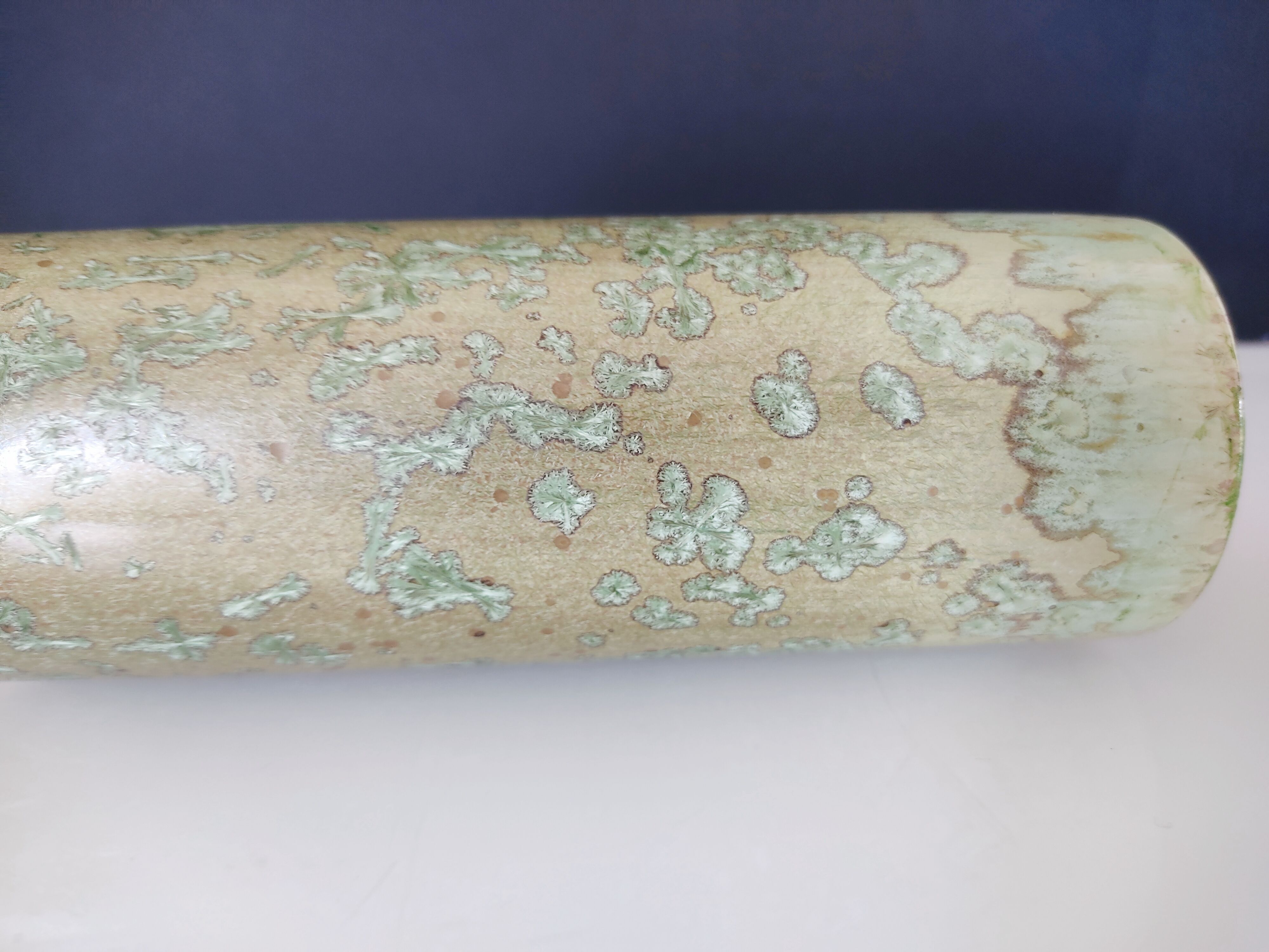 Pale green ceramic roller vase