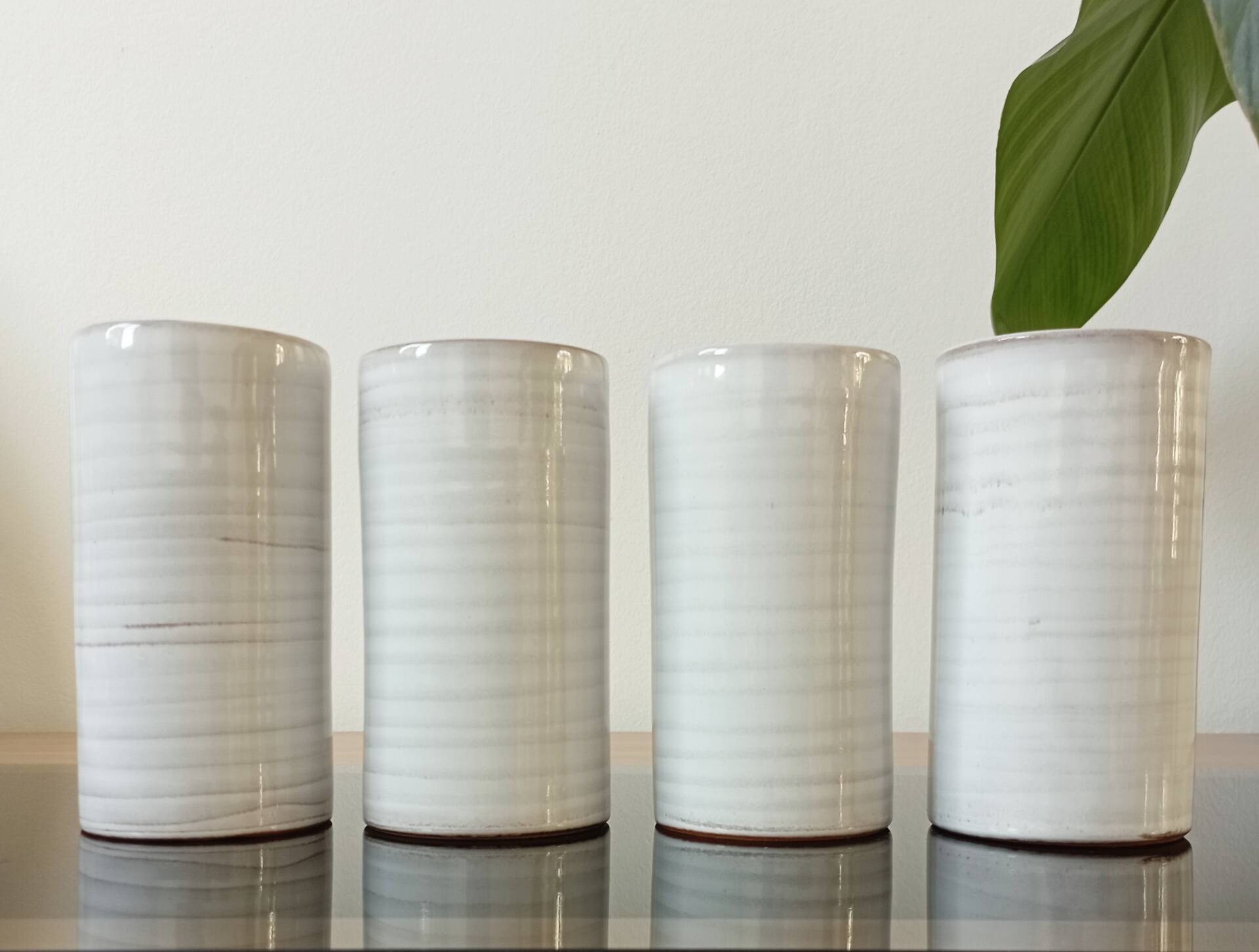 4 vintage stoneware cups in white