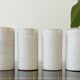 4 vintage stoneware cups in white