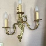 Louis XV-style wall light in solid bronze