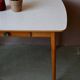 1950s Formica kitchen table with tapered legs and vintage drawer.