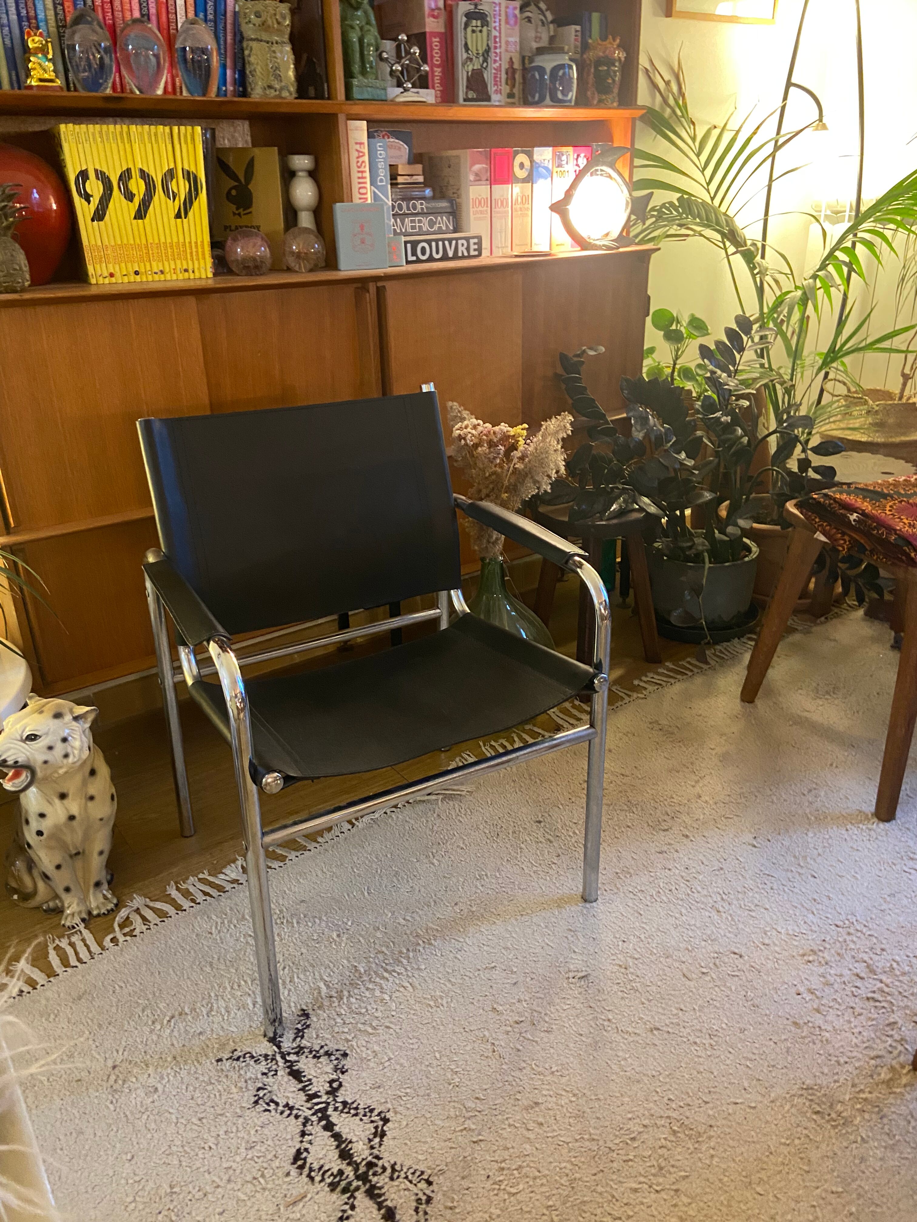Tubular armchair and vintage skaï