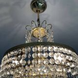 Cascade chandelier with crystal and brass tassels
