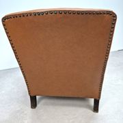 50s club chair in imitation leather and wood