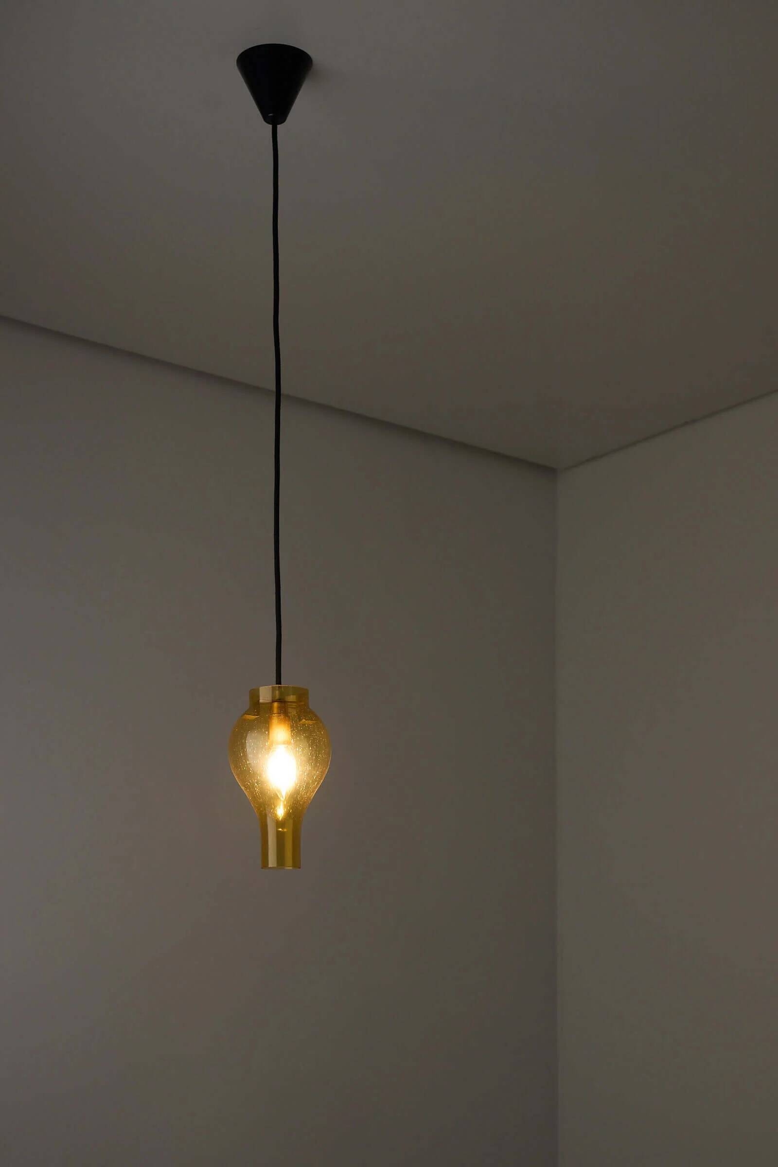 Yellow glass pendant lamp with bubbles