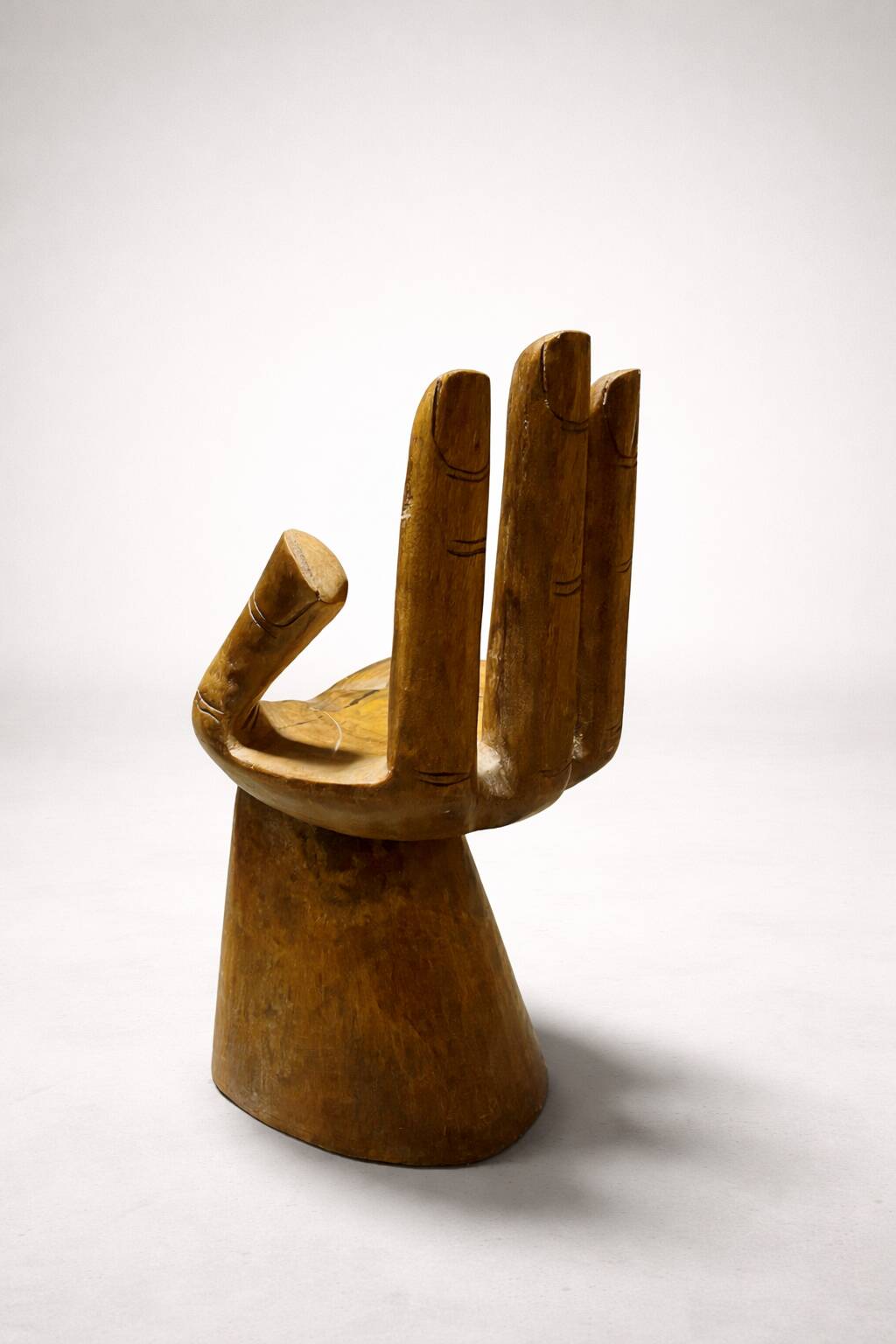 Sculptural wooden armchair – hand shape