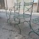 Deux fauteuils et deux chaises de jardin en fer forgé 20 eme
