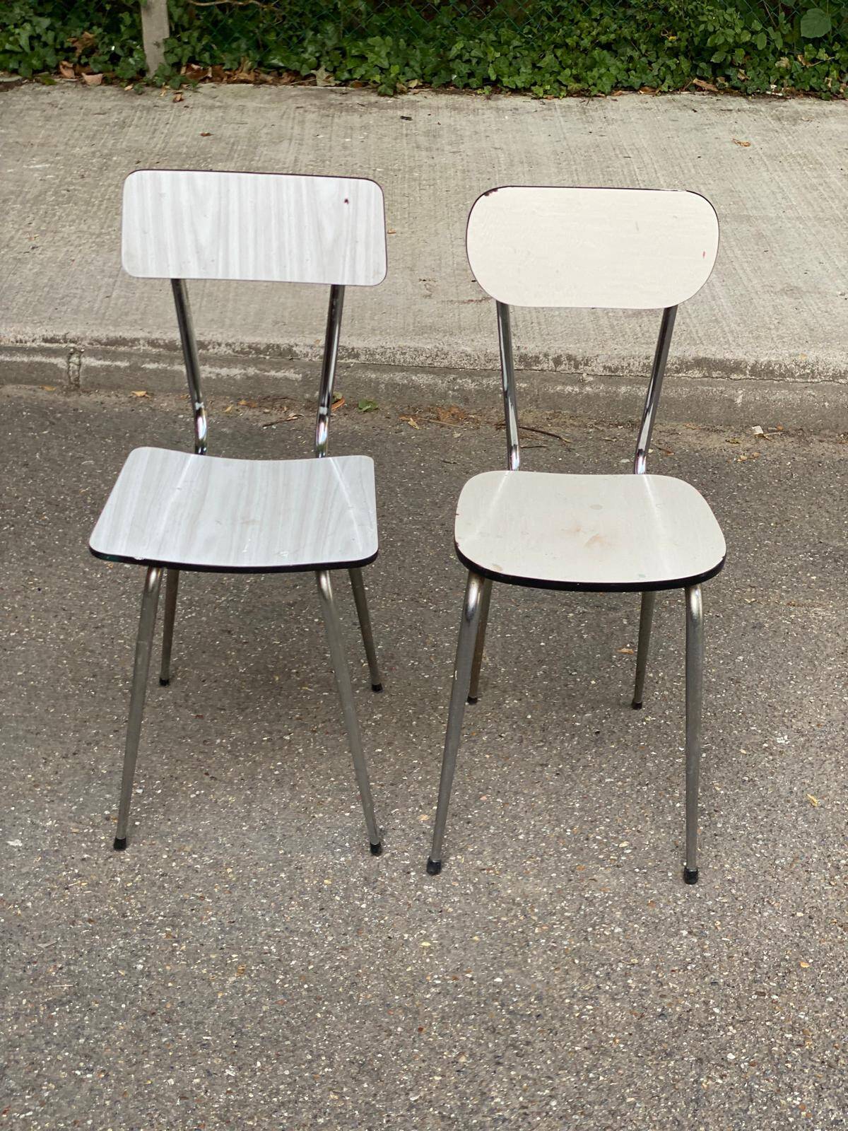 2 beige formica and steel chairs