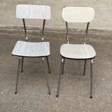 2 beige formica and steel chairs