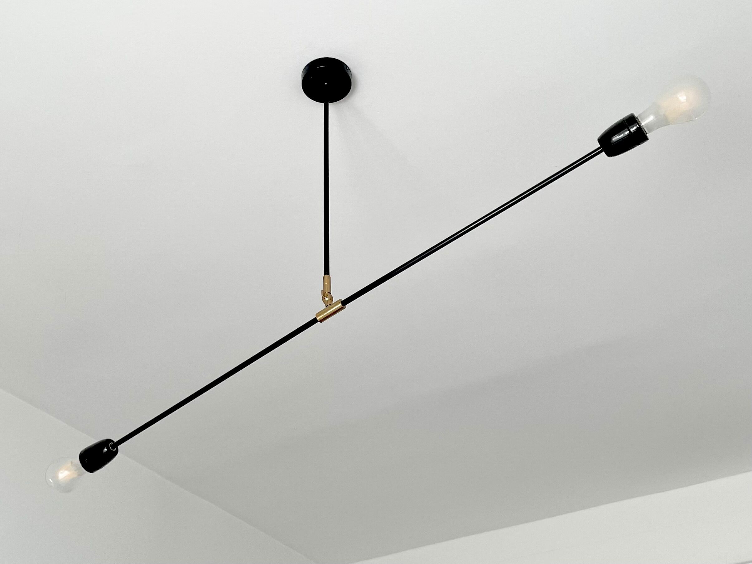 Porcelain lamp and articulable metal