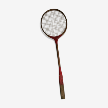 Red ribbon wooden badminton racket