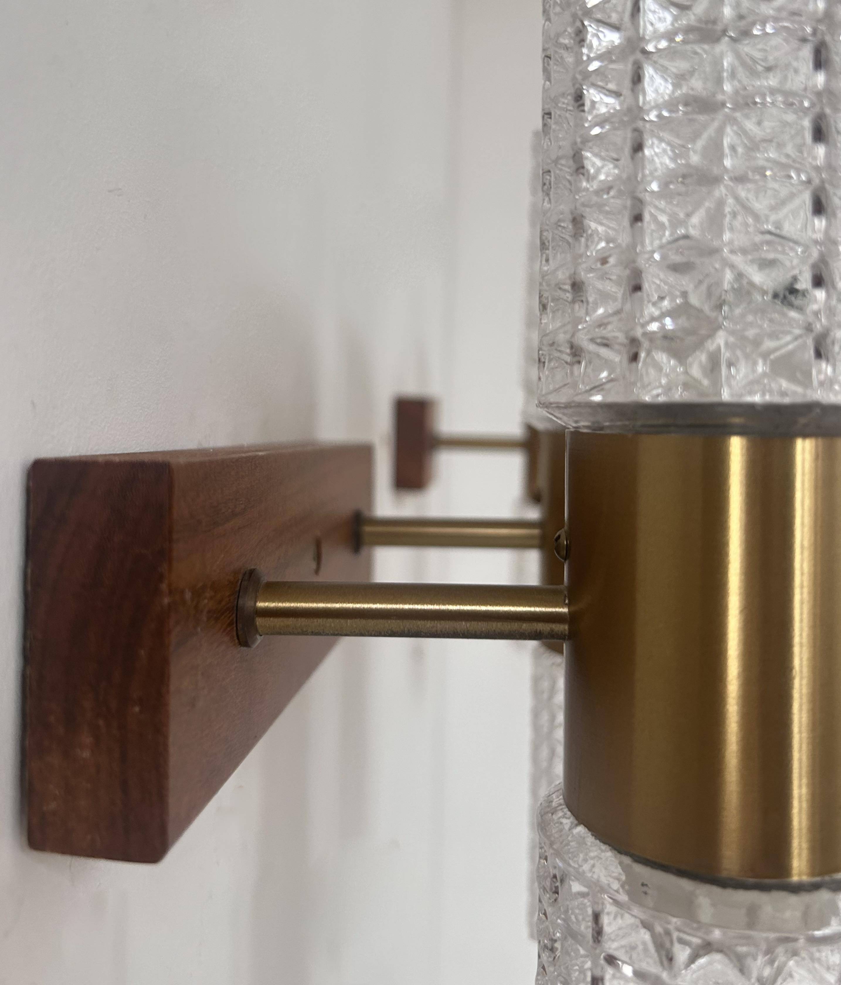 Pair of vintage wall lights, brass and molded glass, Sweden 1960s