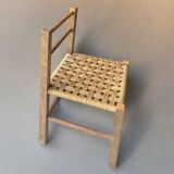 Vintage children's chair made of rope and wood
