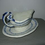 Saucière in Gien earthenware anse in the shape of a dolphin decoration garland 1900