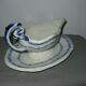Saucière in Gien earthenware anse in the shape of a dolphin decoration garland 1900