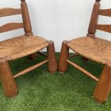 Pair of antique low fire chairs made of wood and straw