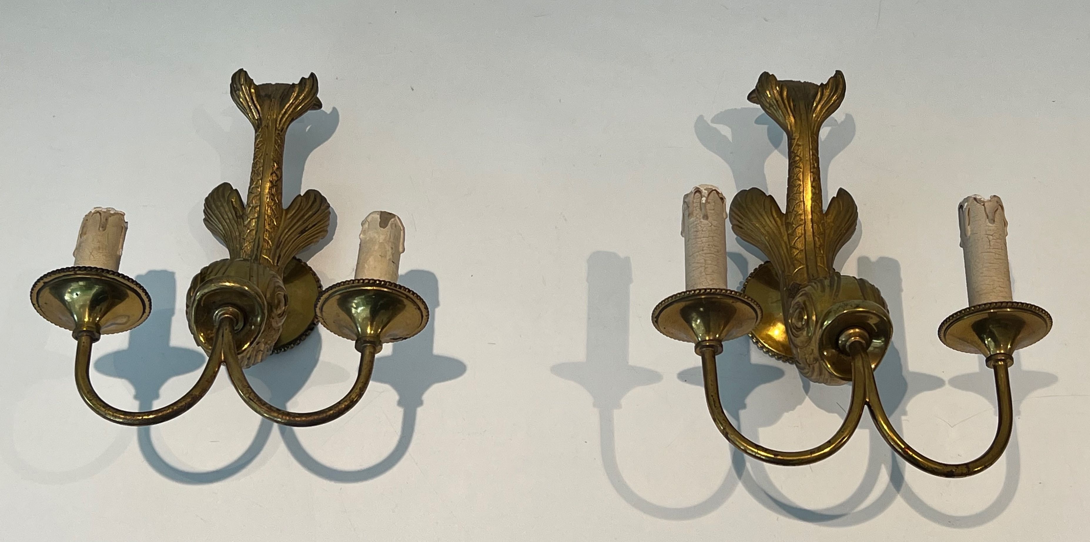 Pair of bronze wall sconces with dolphins by Maison Jansen