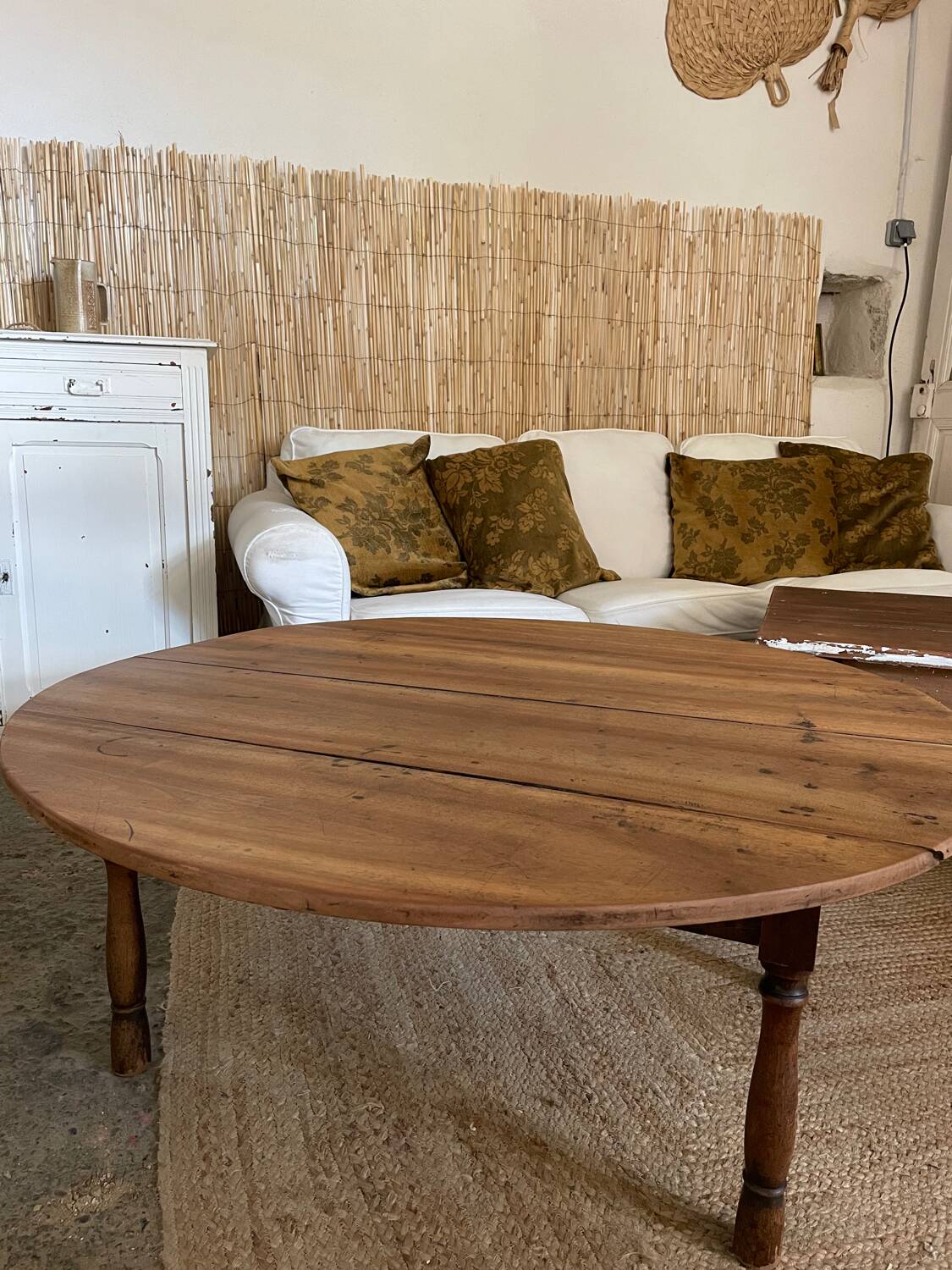 Round coffee table with hinged doors