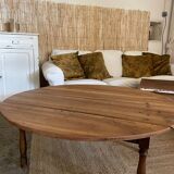 Round coffee table with hinged doors