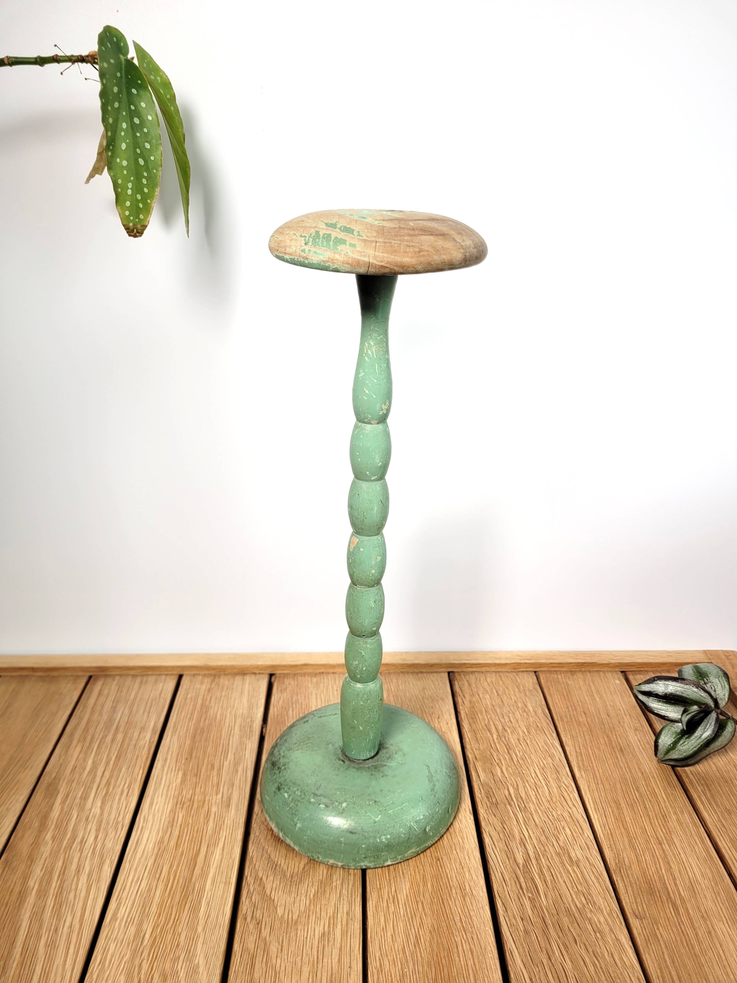 Old green hat holder