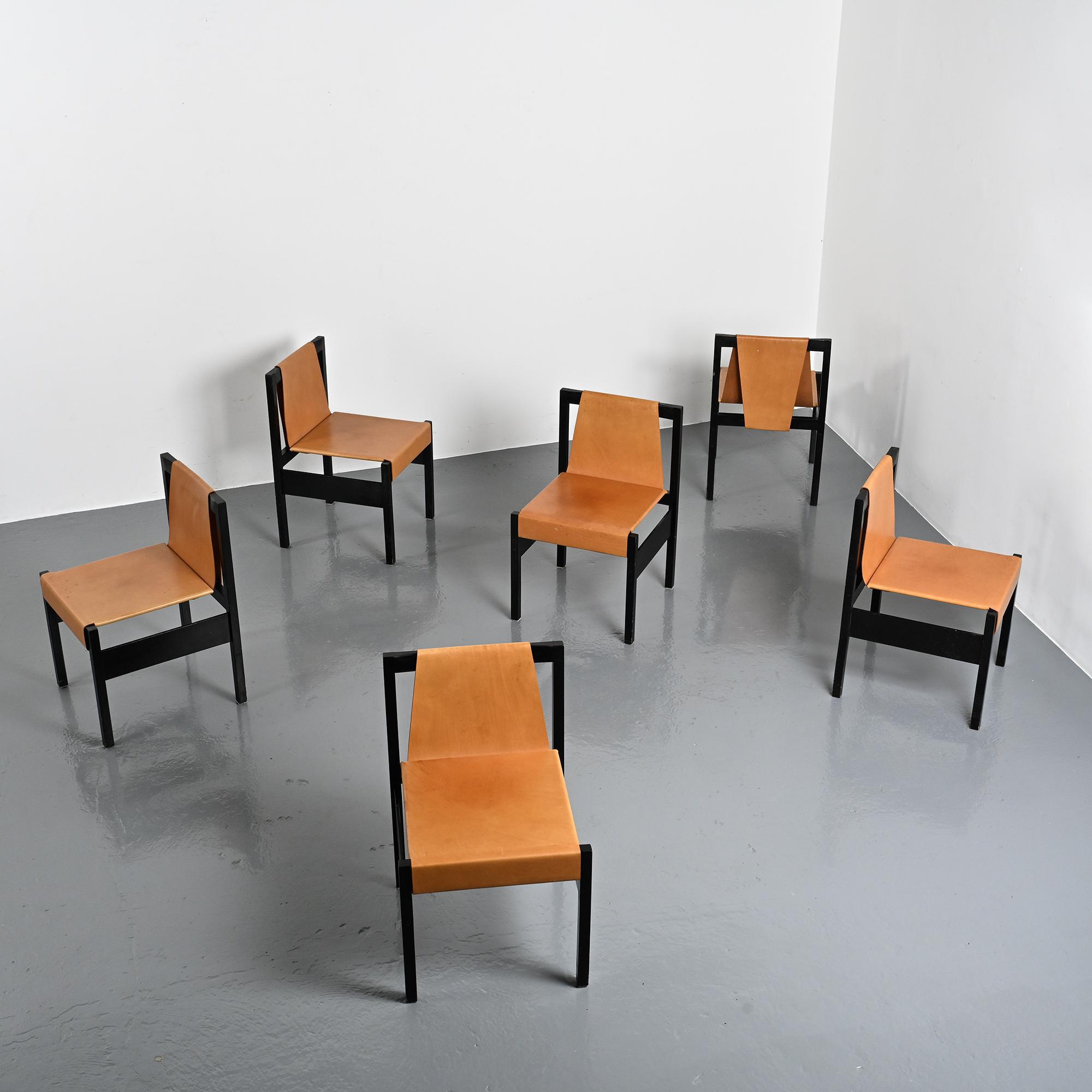 Set of black lacquered wooden chairs with leather, Swiss architect's work, 1980s.