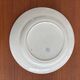 Round plate Longwy model Mignon – Antique earthenware with floral and bird decoration.