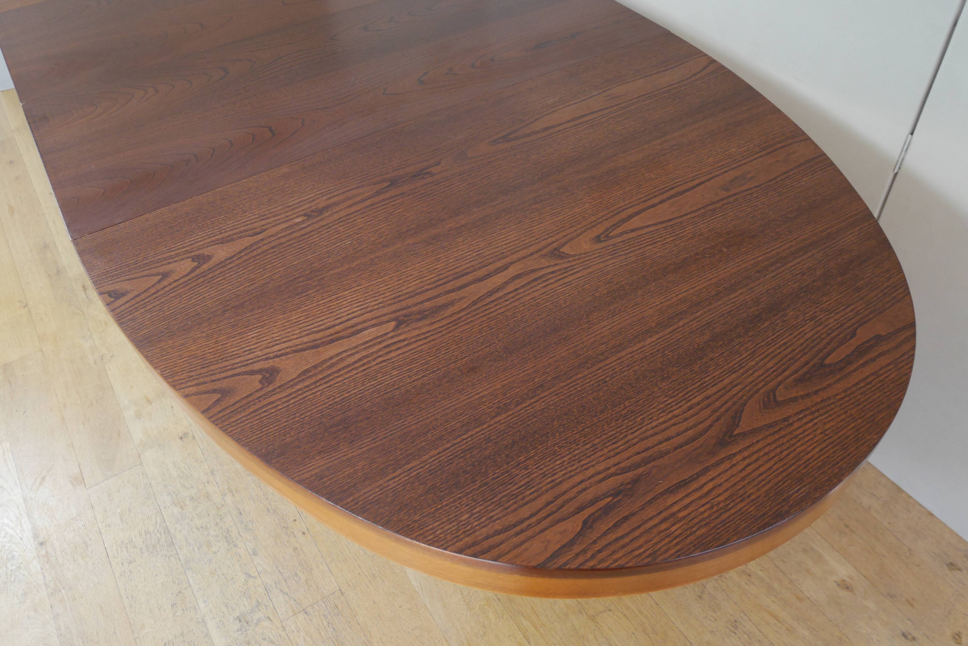Extendable oval table baumann in elm central foot