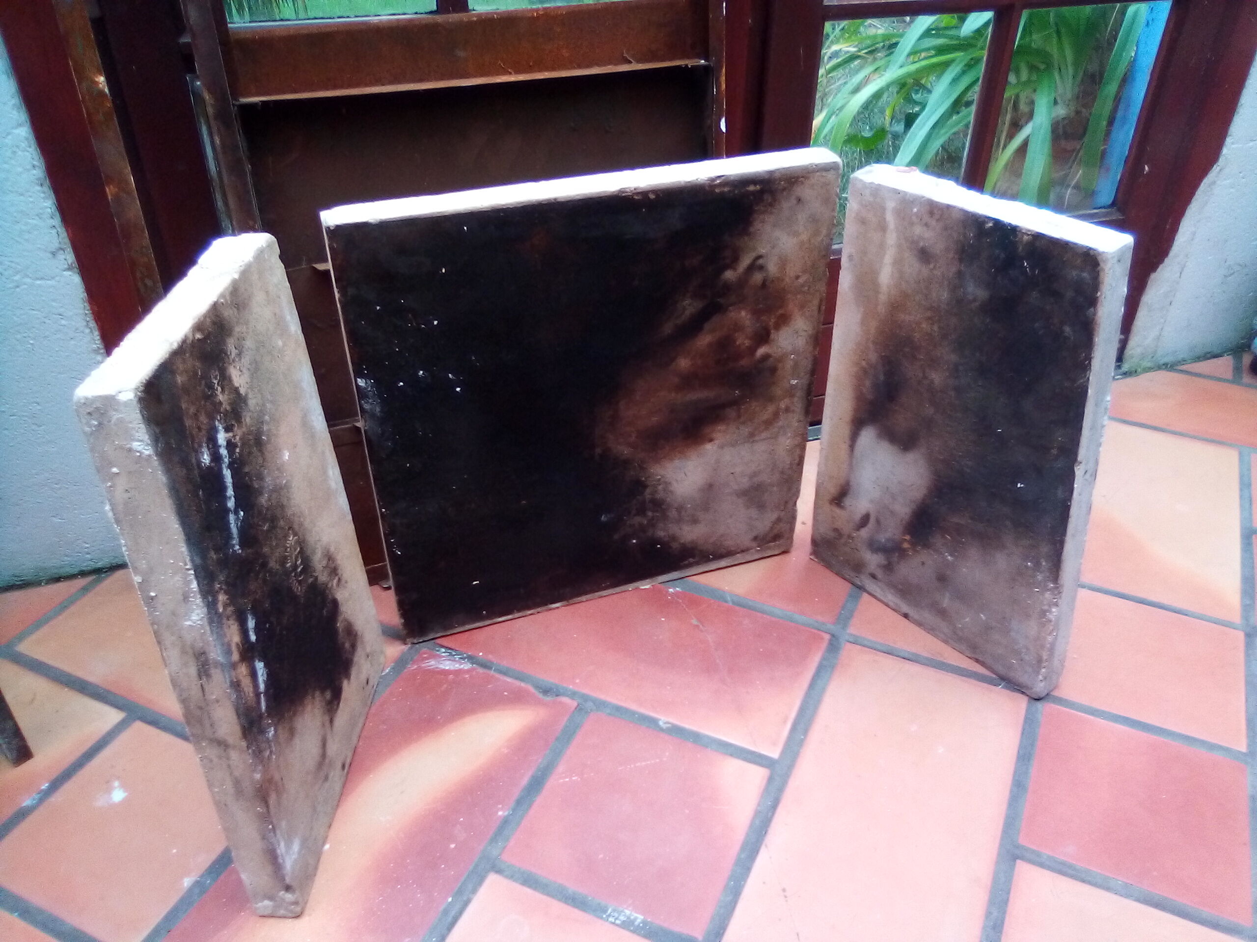 White veined black marble fireplace